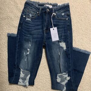 Risen jeans size 7, 28w. New with tags!